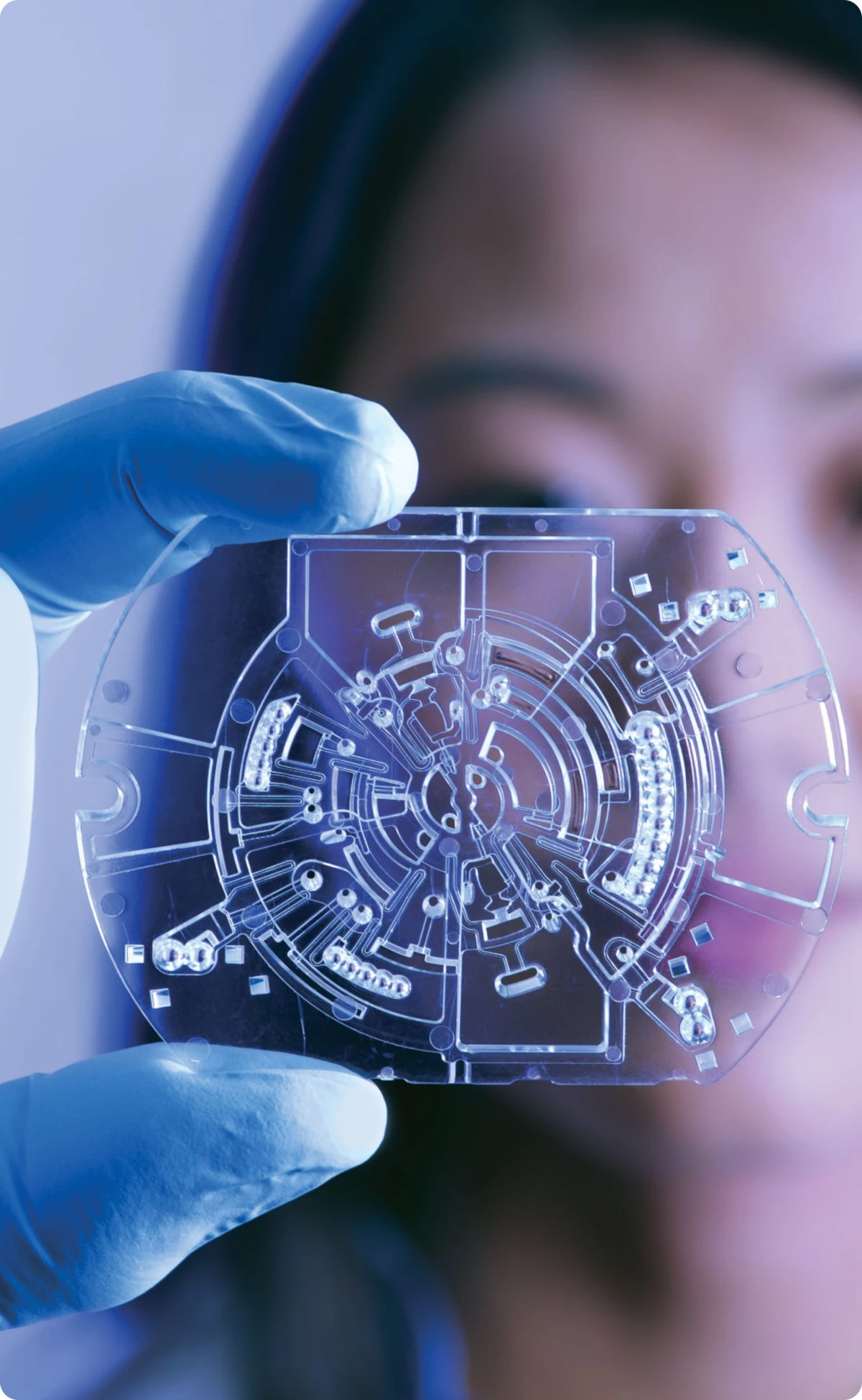 Women holding a thinXXS Microfluidic Assay 